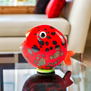 marine style animal figure sculpture with yellow base