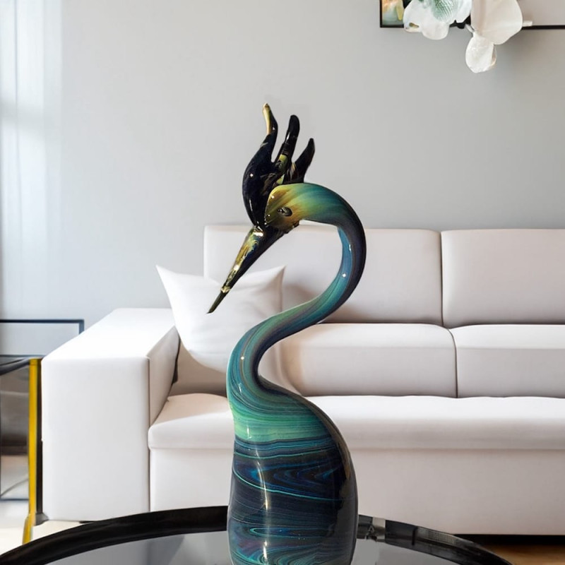 scultura uccello verde e blu