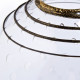 clear glass vase with golden spiral detail