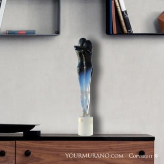 human figure sculpture on square base of modern design