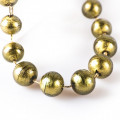 GRANNY SMITH grey gold leaf details necklace