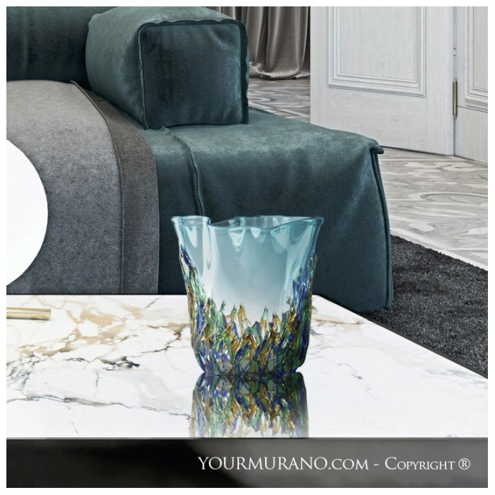 decorative handcrafted vase with blue and green details