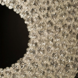 Wall mirror with floral decorations