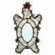 Oval-shaped mirror in Murano glass
