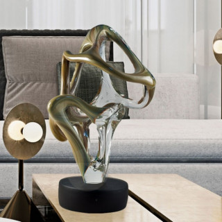 scultura astratta con base tonda per arredo casa