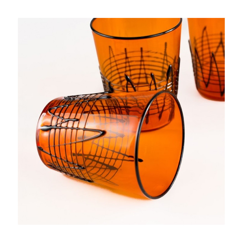 Bicchieri artigianali in vetro arancio e filamenti neri