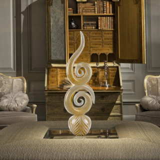 scultura astratta con base tonda per arredo casa