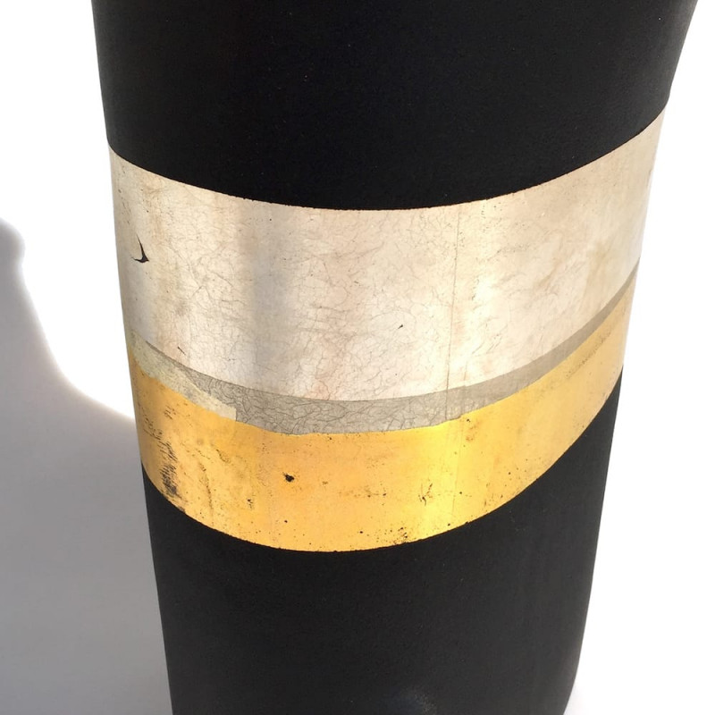 Decorative black vase with gold details
