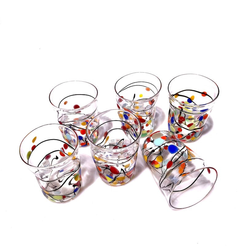 Clear blown-glass tumblers with colored spots