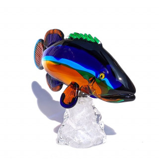 Colored glass fish sculpture on crystal wave base
